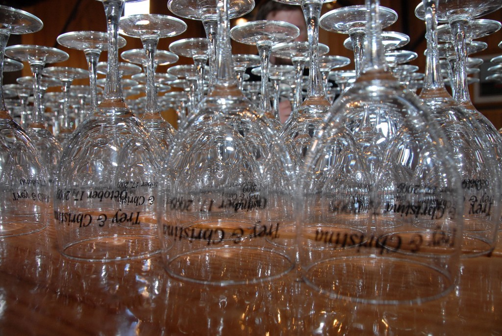 wine glasses engraved with the name of the happy couple